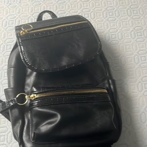 Small black backpack never used, (pick up olny)